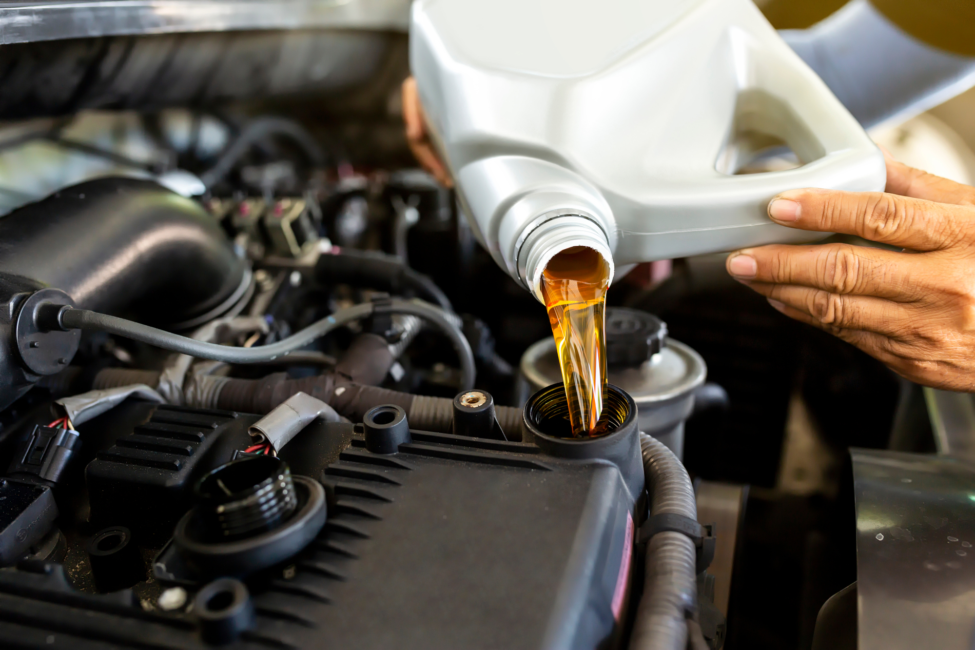 Replacing and Pouring Fresh Oil Into Engine