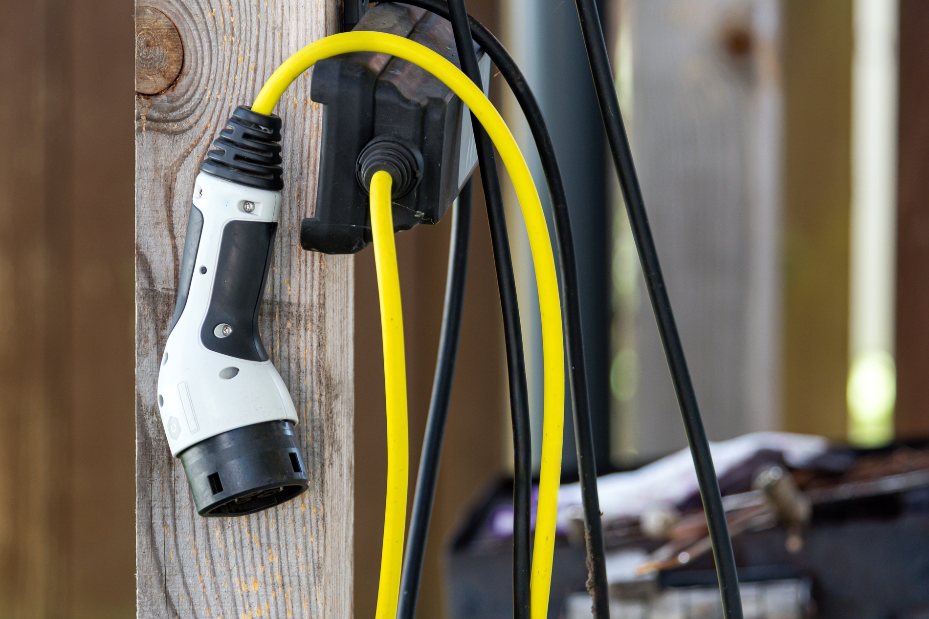 EV charging cable inspection close-up check damage