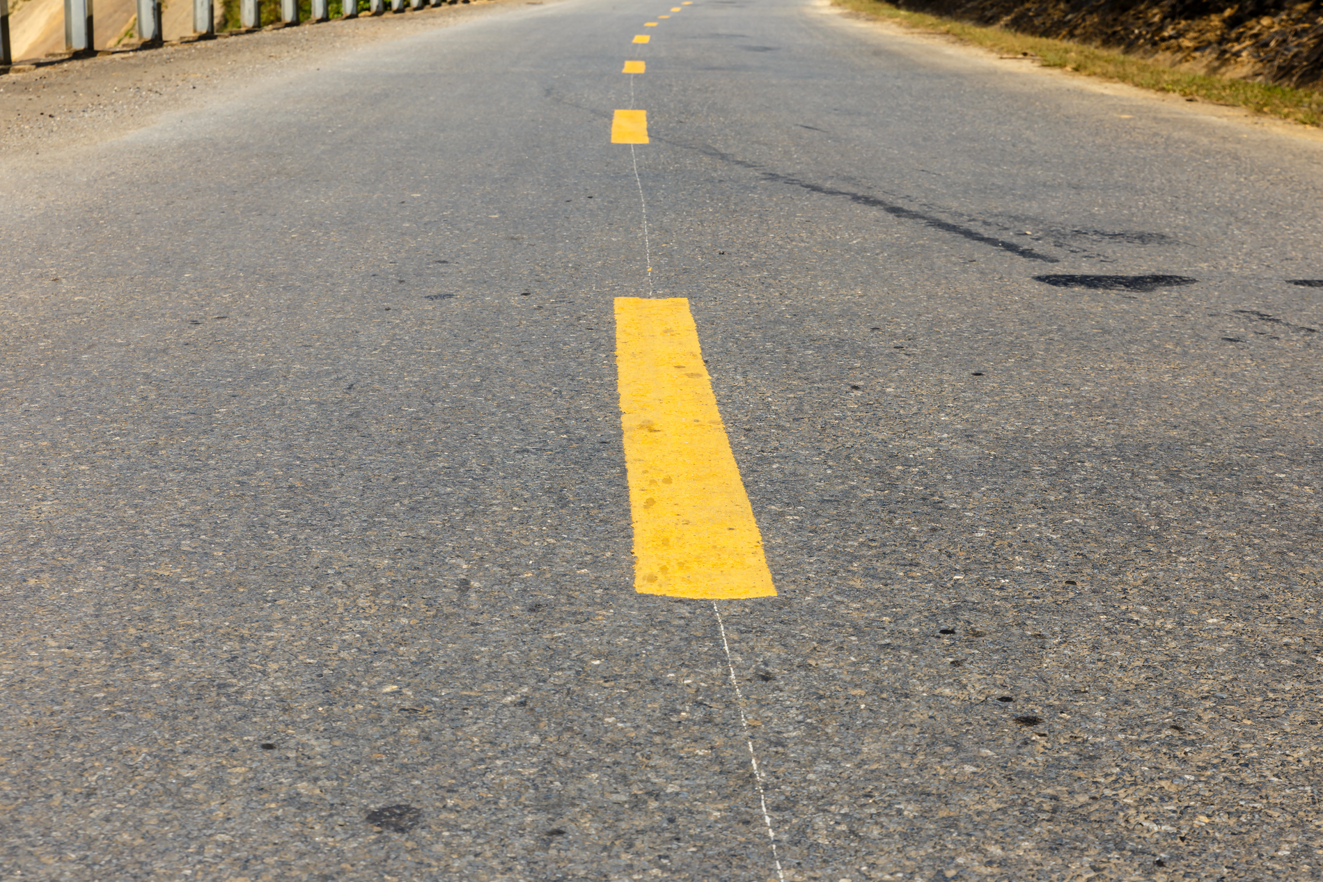 Broken yellow center line